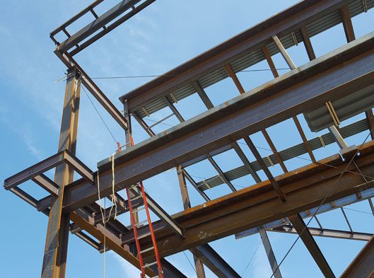 A metal structure with some steps and a ladder